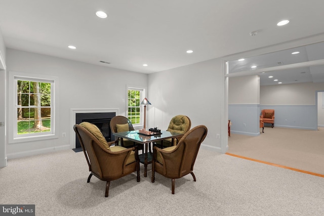 301 Reserve Gate Ter, Silver Spring, MD 20905 - carpeted dining space featuring recessed lighting, baseboards, healthy amount of natural light, and a fireplace with flush hearth