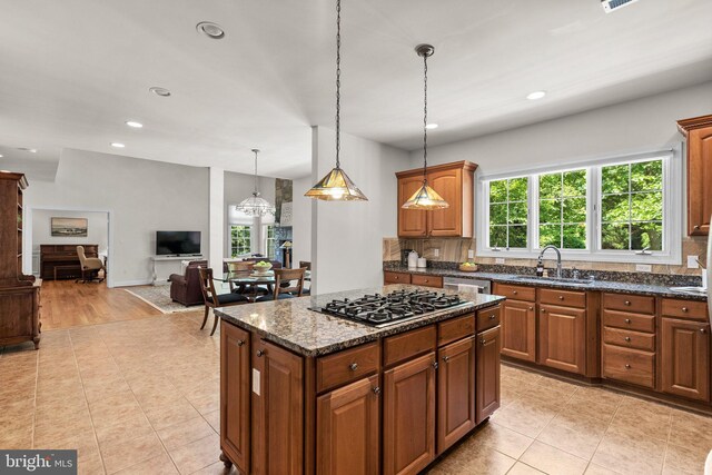 301 Reserve Gate Ter, Silver Spring, MD 20905 - kitchen featuring a sink, gas cooktop, recessed lighting, a center island, and open floor plan