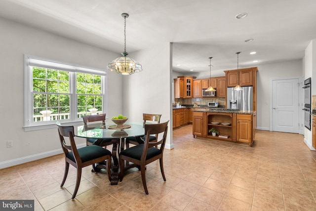 301 Reserve Gate Ter, Silver Spring, MD 20905 - dining area with baseboards, light tile patterned floors, a chandelier, and recessed lighting