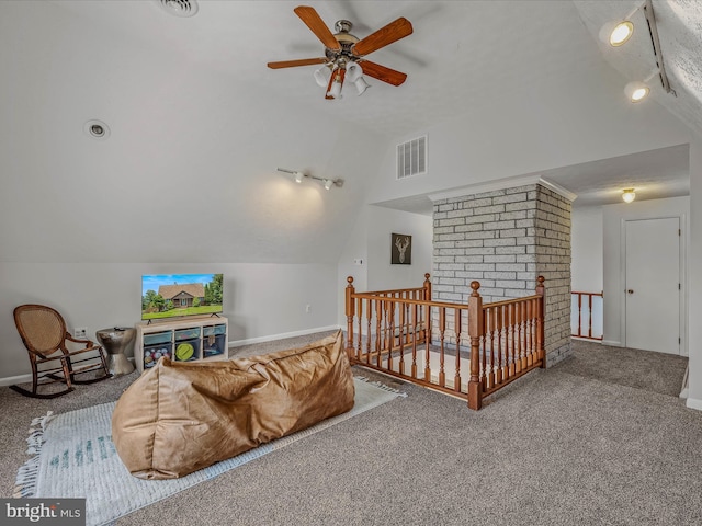 3906 Highland Ridge Rd, Berkeley Springs, WV 25411 - carpeted living room featuring lofted ceiling, rail lighting, ceiling fan, and baseboards