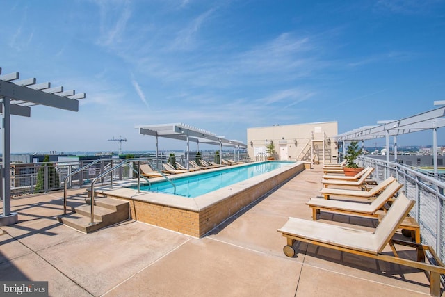 view of pool featuring a pergola