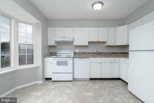17 Powhurst Ct, Nottingham, MD 21236 - kitchen with white appliances, under cabinet range hood, a sink, white cabinetry, and baseboards