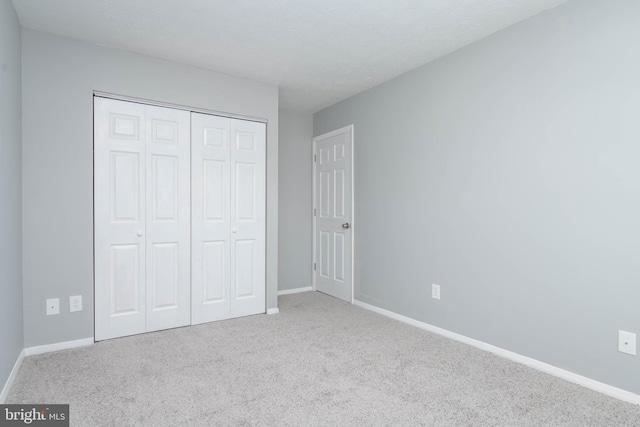 17 Powhurst Ct, Nottingham, MD 21236 - unfurnished bedroom with carpet flooring, baseboards, and a closet