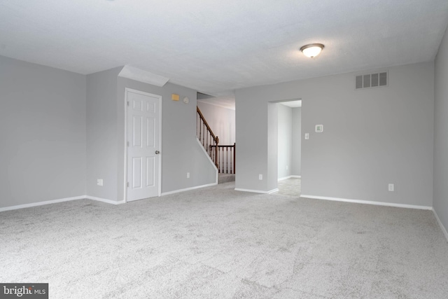 17 Powhurst Ct, Nottingham, MD 21236 - spare room with stairs, carpet flooring, and baseboards
