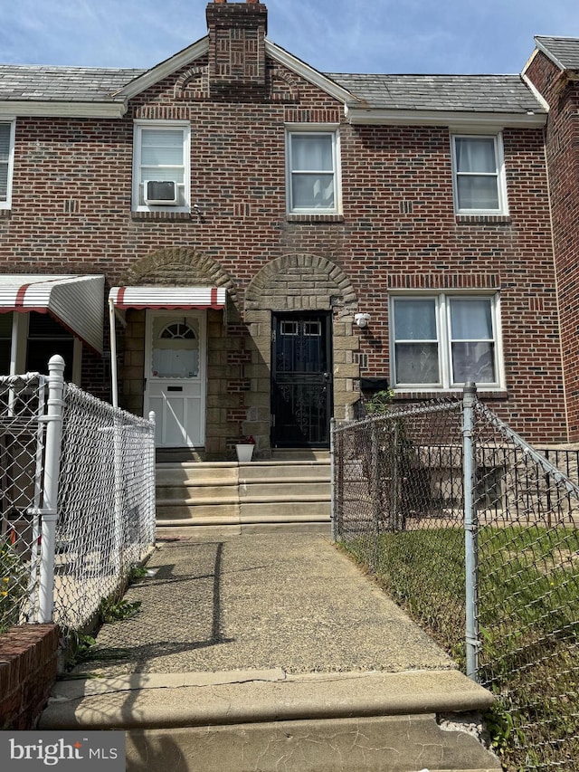 4602 Ashville St, Philadelphia, PA 19136 - view of property with fence, brick siding, and cooling unit