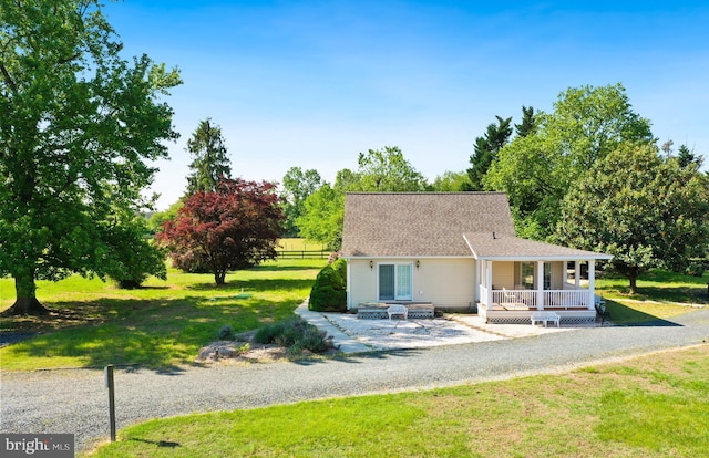 300 Hickory Ln, Chestertown, MD 21620 - back of house featuring a porch, a lawn, and roof with shingles