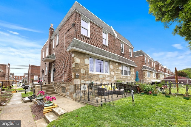 1742 Tustin St, Philadelphia, PA 19152 - rear view of house with stone siding, brick siding, a shingled roof, and a residential view