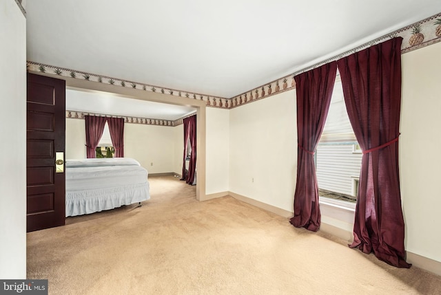 109 Chew Ave W, Saint Michaels, MD 21663 - bedroom with carpet floors, baseboards, and multiple windows