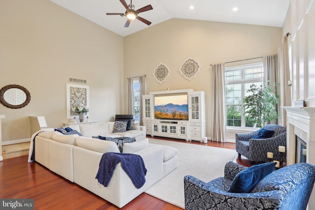 13 Lenape Ct, Mount Laurel, NJ 08054 - living room with a ceiling fan, a glass covered fireplace, wood finished floors, high vaulted ceiling, and baseboards