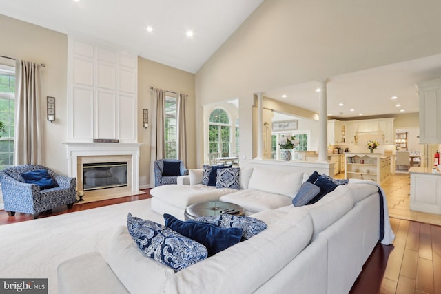 13 Lenape Ct, Mount Laurel, NJ 08054 - living area with wood finished floors, a fireplace, recessed lighting, and high vaulted ceiling