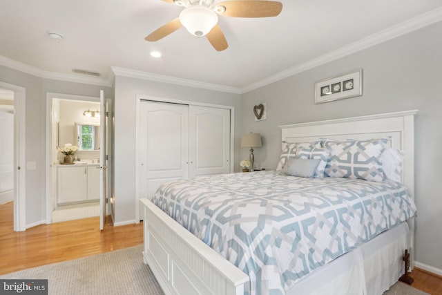 13 Lenape Ct, Mount Laurel, NJ 08054 - bedroom featuring a closet, crown molding, light wood finished floors, ceiling fan, and baseboards