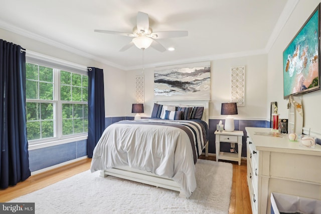 13 Lenape Ct, Mount Laurel, NJ 08054 - bedroom with light wood-style flooring, crown molding, a wainscoted wall, and ceiling fan
