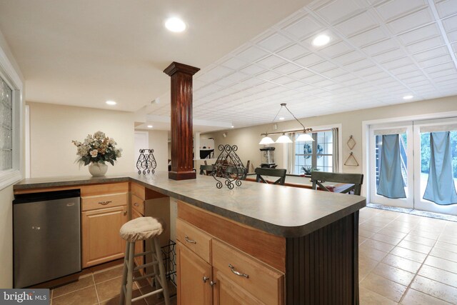 13 Lenape Ct, Mount Laurel, NJ 08054 - kitchen with plenty of natural light, fridge, recessed lighting, ornate columns, and tile patterned flooring