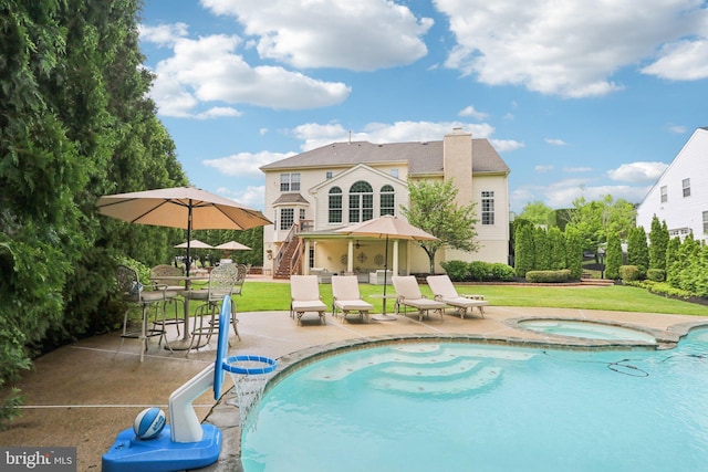 13 Lenape Ct, Mount Laurel, NJ 08054 - rear view of house with an in-ground hot tub, a patio, stairs, and a lawn