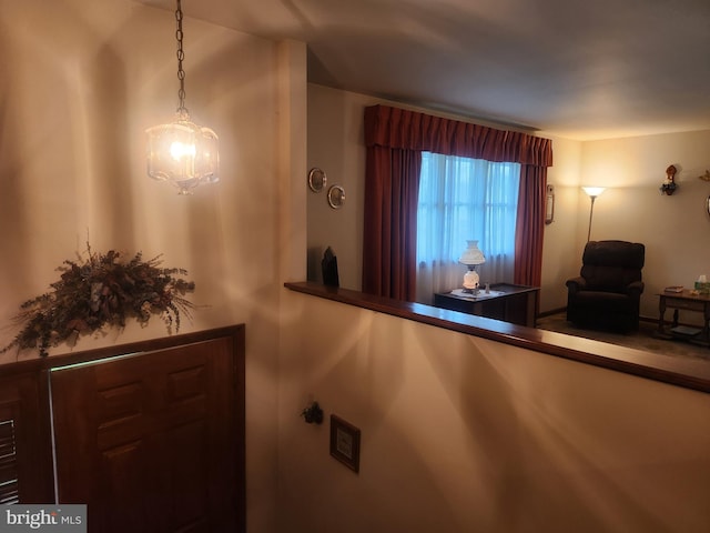 reception area featuring a chandelier