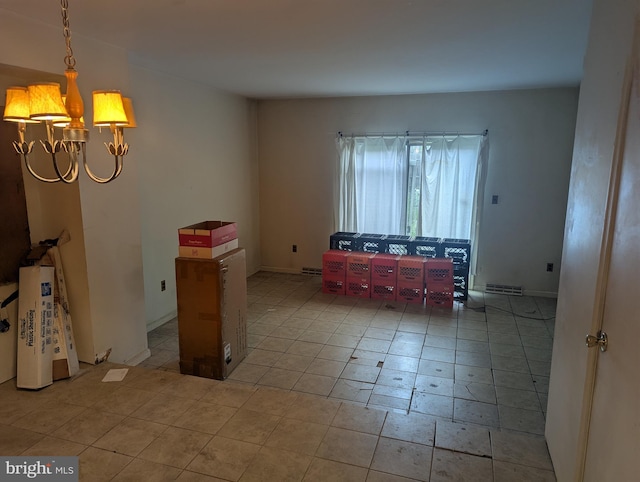 523 W 3rd St, Wilmington, DE 19801 - spare room featuring a chandelier and light tile patterned floors