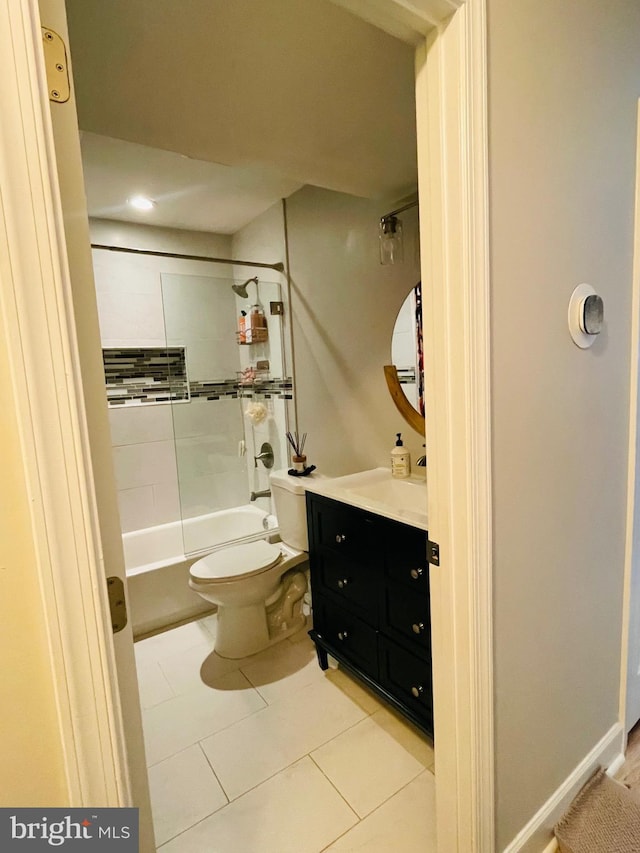 full bath featuring toilet, tile patterned flooring, vanity, shower / tub combination, and recessed lighting