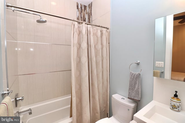 full bathroom featuring shower / tub combo and toilet