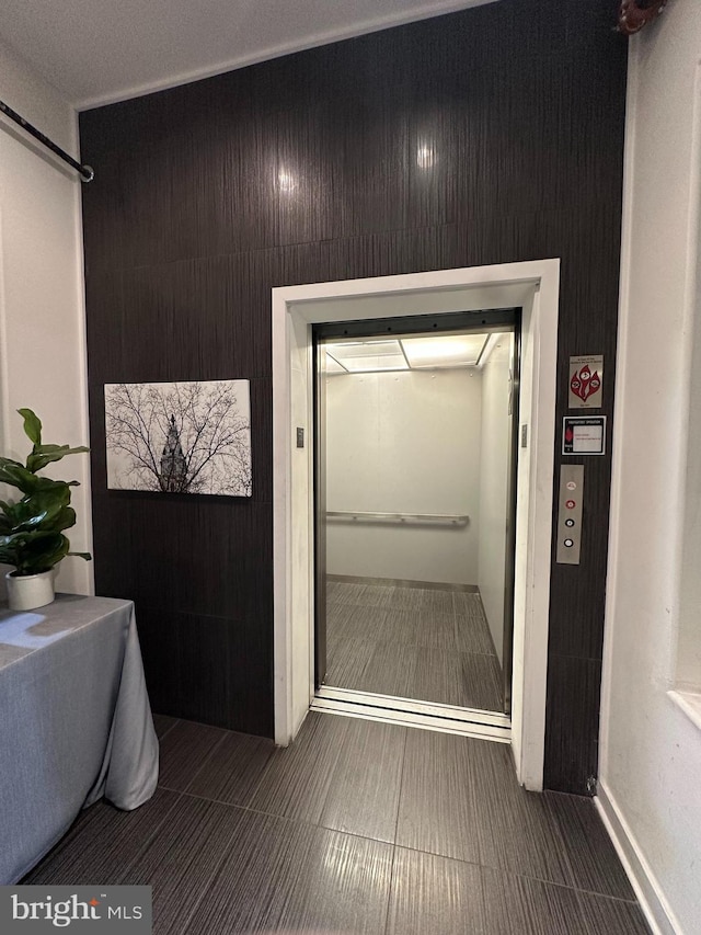 bathroom featuring elevator