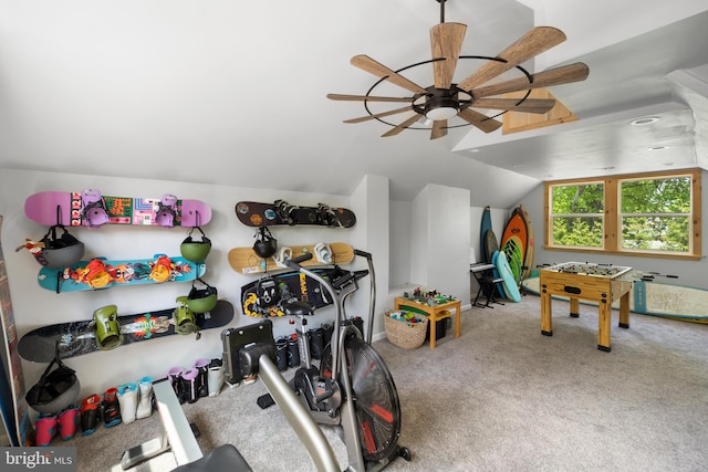 playroom featuring lofted ceiling, a ceiling fan, and carpet floors