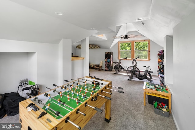 rec room with carpet flooring, lofted ceiling, a ceiling fan, and baseboards
