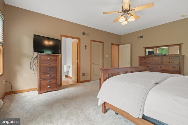 12451 High Point Rd, Felton, PA 17322 - bedroom featuring light colored carpet, baseboards, ensuite bath, and ceiling fan
