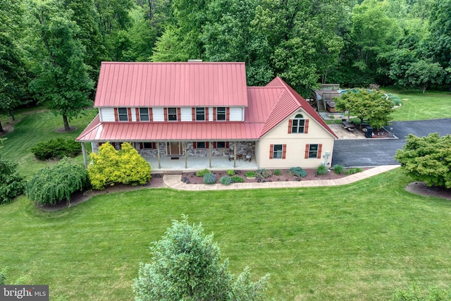 12451 High Point Rd, Felton, PA 17322 - view of front of property with a front yard, stone siding, and stucco siding