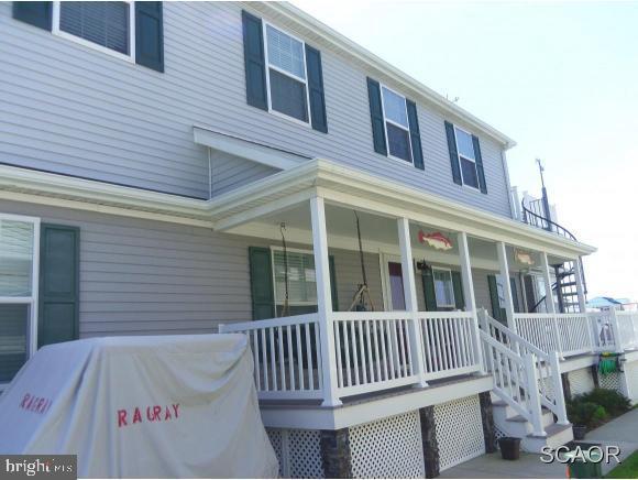 38802 Tyler Ave, Selbyville, DE 19975 - view of property exterior featuring covered porch