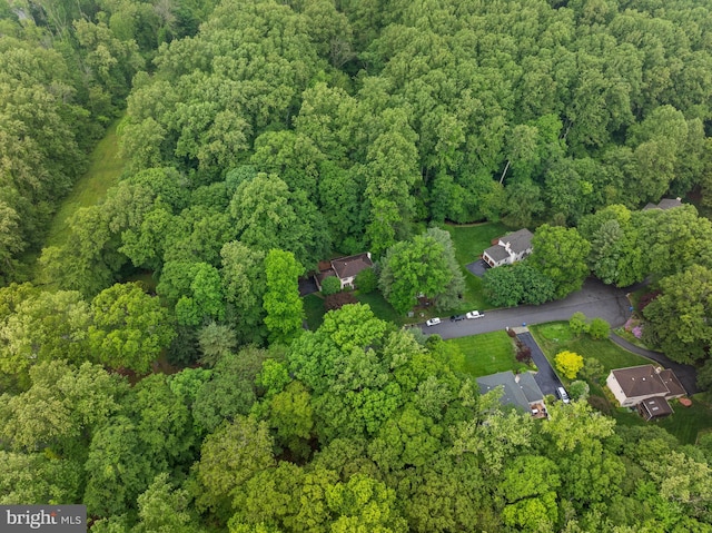 aerial overview of property's location featuring a forest