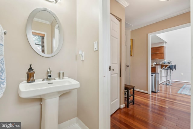 2307 Bright Leaf Way, Baltimore, MD 21209 - bathroom with ornamental molding, wood finished floors, and baseboards