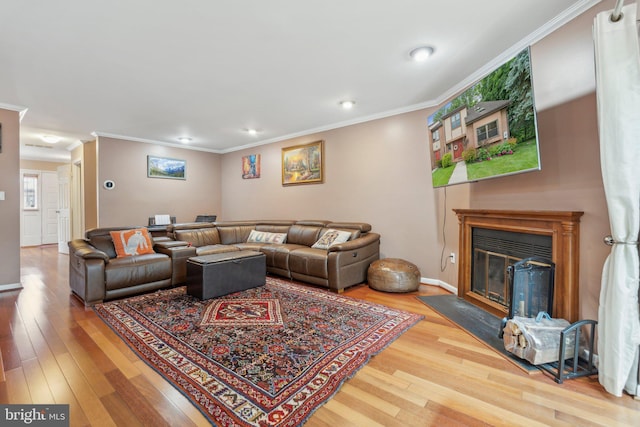 2307 Bright Leaf Way, Baltimore, MD 21209 - living room with wood-type flooring, crown molding, a glass covered fireplace, recessed lighting, and baseboards