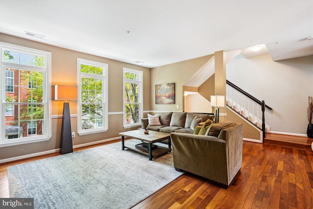 623 Main St Unit 623-B, Gaithersburg, MD 20878 - living room with stairway, dark wood-style flooring, healthy amount of natural light, and baseboards