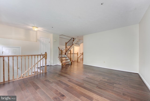 19202 Cross Ridge Dr, Germantown, MD 20874 - unfurnished room with wood finished floors, baseboards, and stairway