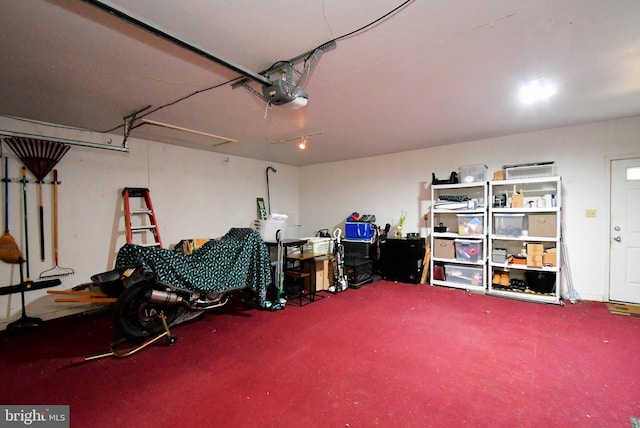 garage featuring a garage door opener