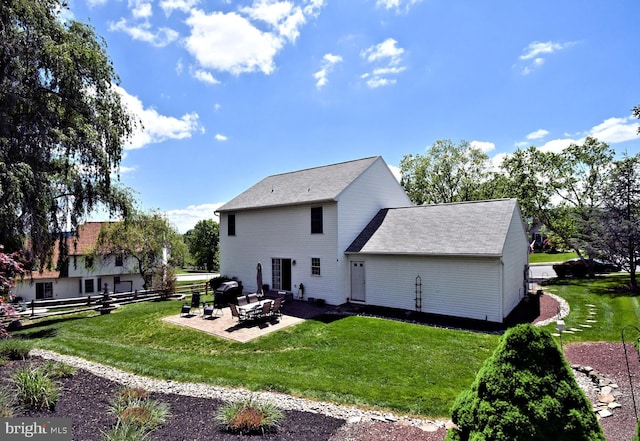 back of house with a patio area