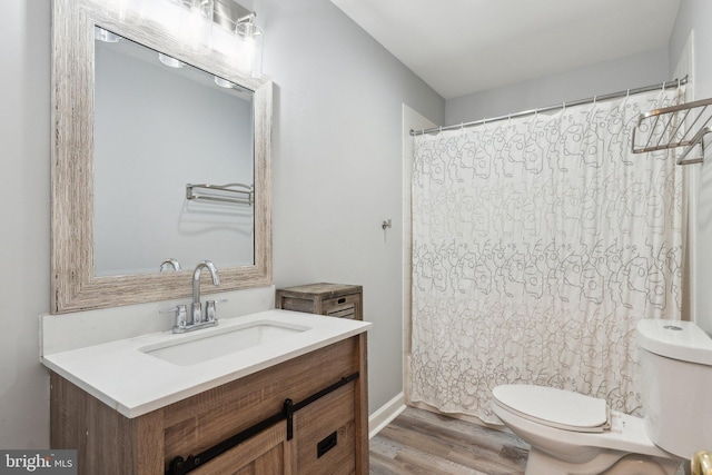 16110 Amethyst Ln, Bowie, MD 20716 - full bathroom with toilet, vanity, and wood finished floors