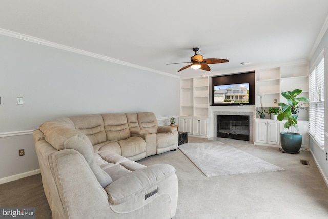 16110 Amethyst Ln, Bowie, MD 20716 - living area featuring carpet floors, ceiling fan, baseboards, crown molding, and a premium fireplace