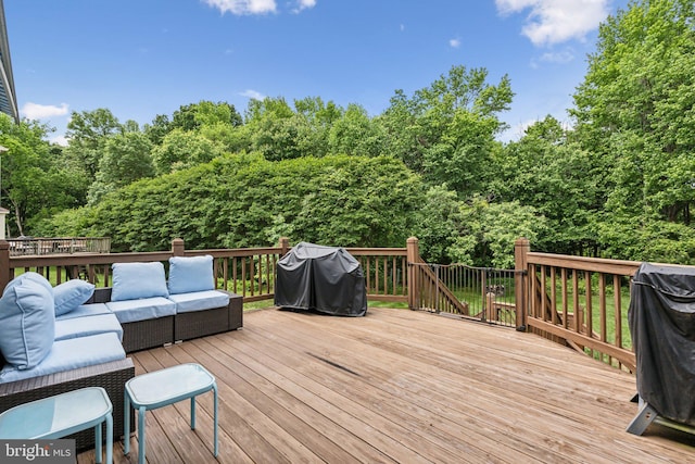 16110 Amethyst Ln, Bowie, MD 20716 - wooden deck with an outdoor hangout area and grilling area