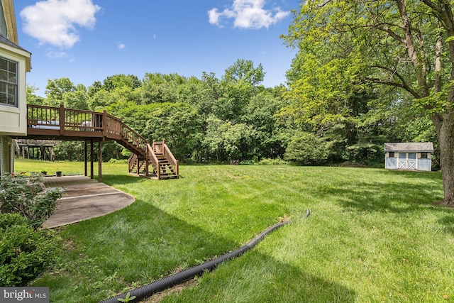 16110 Amethyst Ln, Bowie, MD 20716 - view of grassy yard with stairs, a deck, and a patio