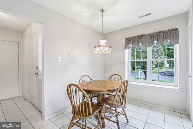 38 Falmouth Dr, Mount Laurel, NJ 08054 - dining area with light tile patterned floors, baseboards, and a chandelier