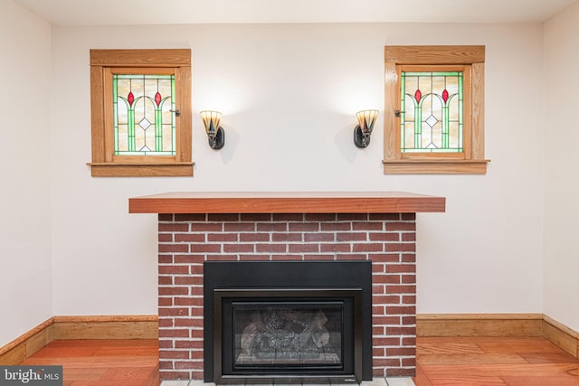 116 N Brobst St, Shillington, PA 19607 - detailed view of a fireplace, wood finished floors, and baseboards