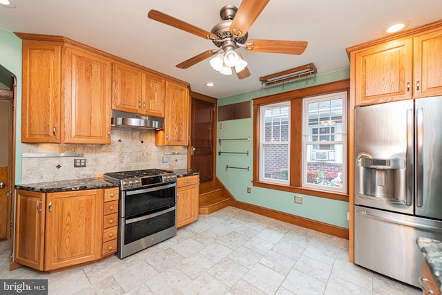 116 N Brobst St, Shillington, PA 19607 - kitchen featuring appliances with stainless steel finishes, under cabinet range hood, backsplash, a ceiling fan, and baseboards