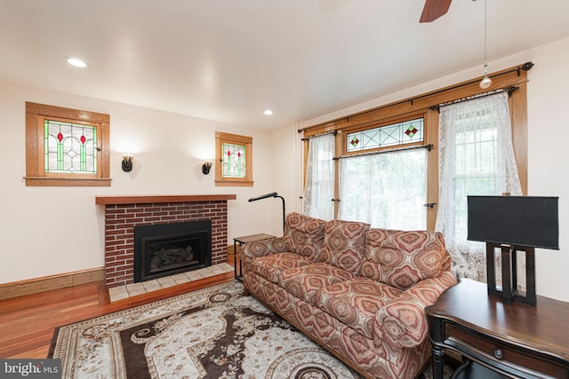116 N Brobst St, Shillington, PA 19607 - living room with wood finished floors, ceiling fan, a fireplace, recessed lighting, and baseboards