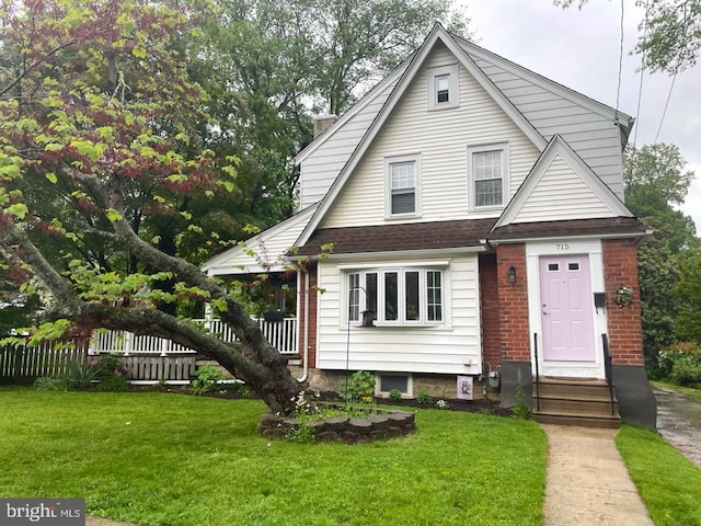 view of front of home with brick siding