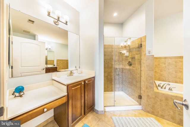 12800 Libertys Delight Dr Unit 403, Bowie, MD 20720 - full bathroom featuring tile patterned floors, a shower stall, a bath, and vanity