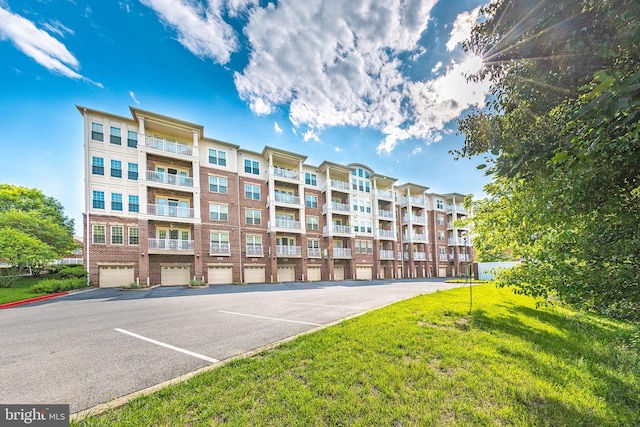 12800 Libertys Delight Dr Unit 403, Bowie, MD 20720 - view of apartment building / complex with uncovered parking