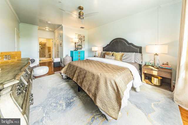 bedroom featuring crown molding, wood finished floors, and ceiling fan