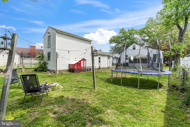 view of yard with a trampoline
