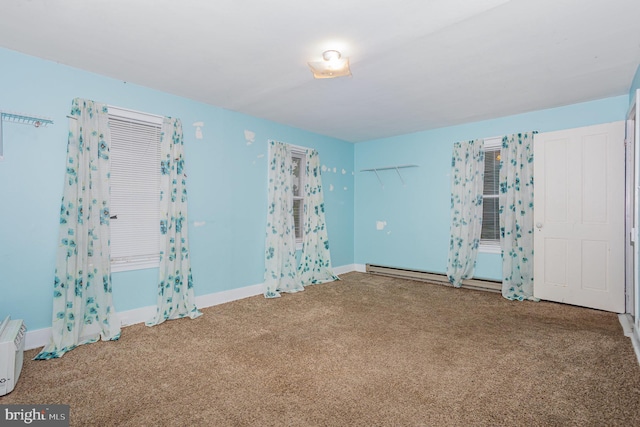 320 E Front St, Lewisberry, PA 17339 - spare room with carpet floors, baseboards, and a baseboard heating unit