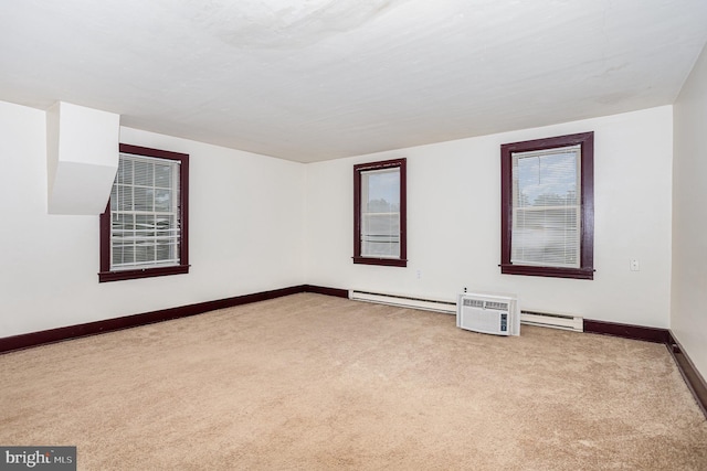 320 E Front St, Lewisberry, PA 17339 - carpeted spare room featuring a baseboard radiator and baseboards